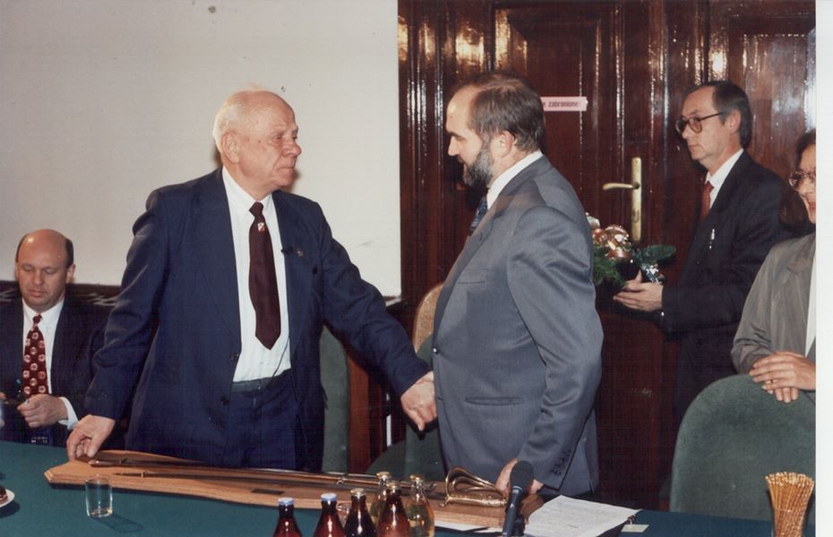 Polish President (Kraków) Jozef Lassota presents Romuald with an inscribed replica sabre during a ceremonial night held at Krakow City Hall.