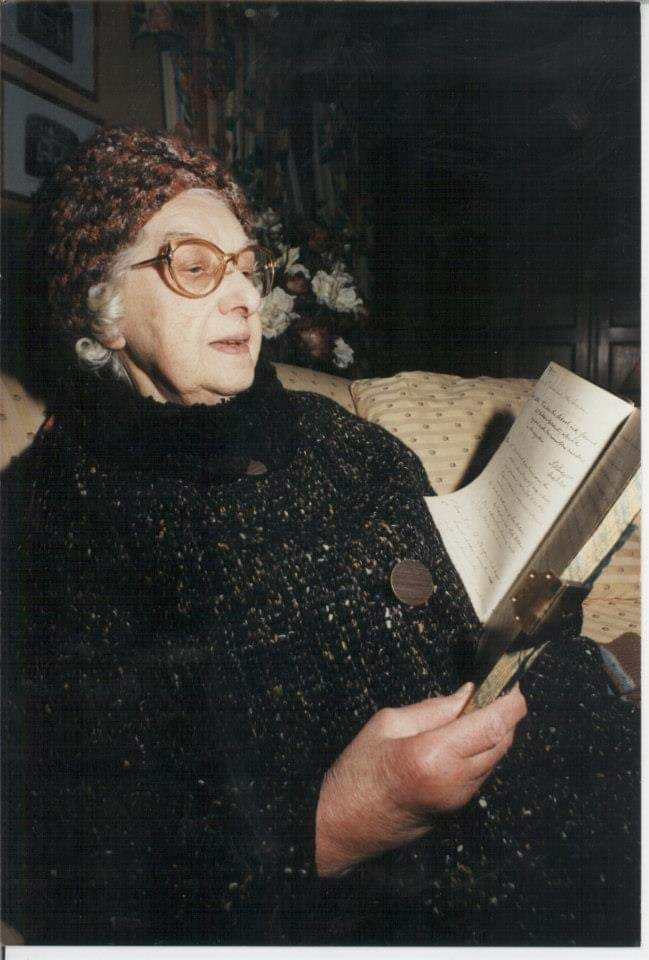 Former pupil and later organ player for the chapel throughout her adult life, Annie Yates reads entries of herself from the school's original diary. Pictured sat within the now converted chapel, 91 years-young Annie reminisces her childhood memories.