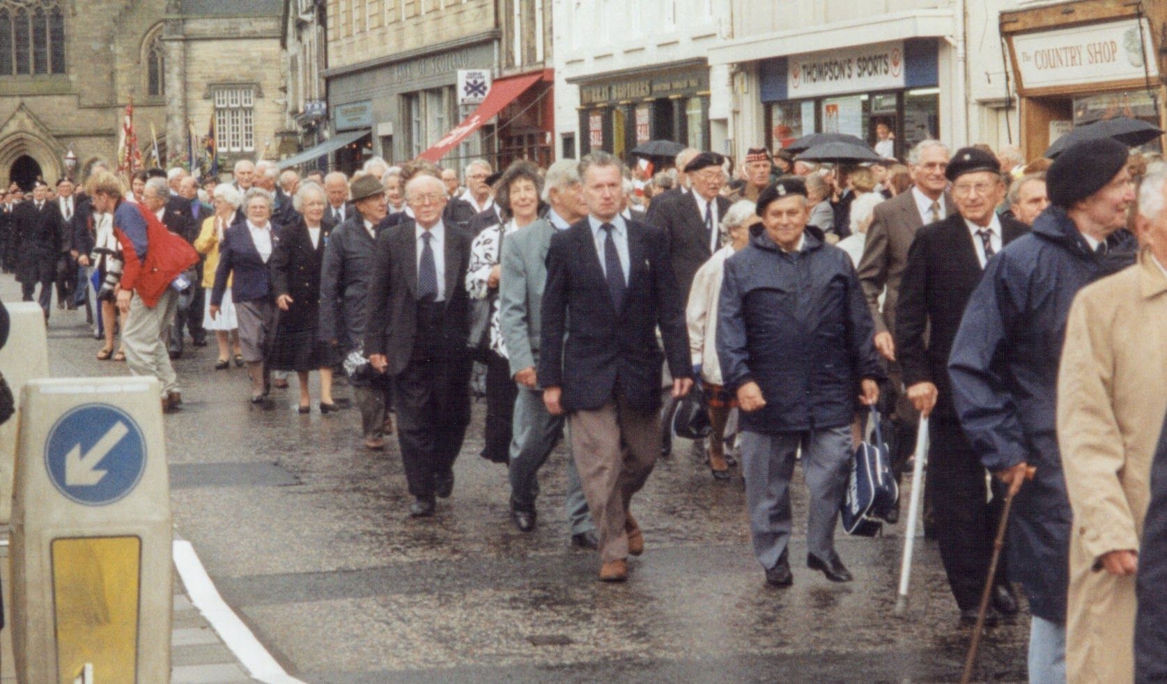 Civilians join in the Polish Tribute march-past.